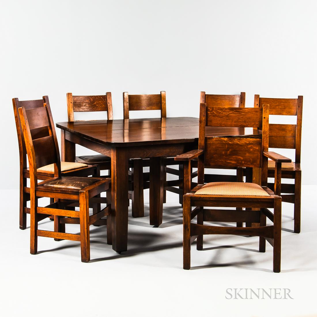 L. & J.G. Stickley Dining Table and Seven Stickley: L. & J.G. Stickley Dining Table and Seven Stickley Brothers Chairs, New York and Michigan, early 20th century, oak, table with three extension leaves, ht. 29 1/2, wd. 44, dp. 48, each leaf 48 x 9, one