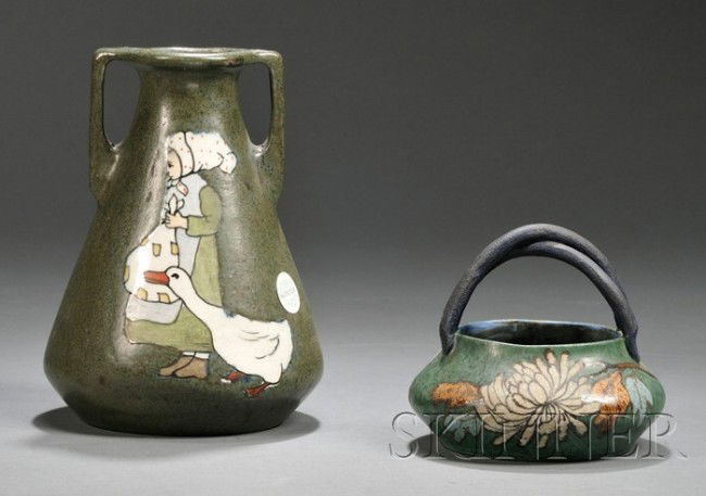 Two Eduard Stellmacher Vases Decorated earthenware: Two Eduard Stellmacher Vases Decorated earthenware Stellmacher Potterie, Czech Republic (Turn-Teplitz, Bohemia Austria), 1905-1912 A flared body vase with two angled handles, decorated on the side wit