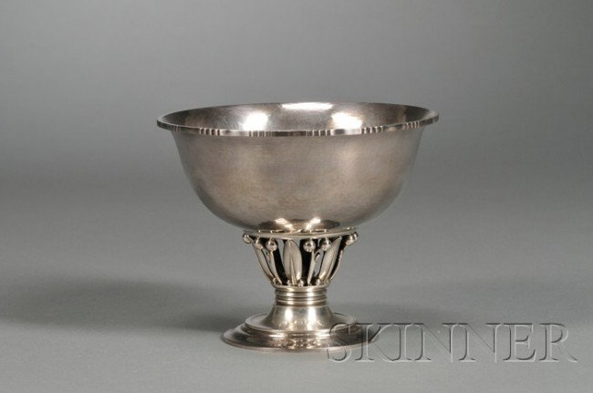 Georg Jensen Footed Bowl Sterling silver Copenhage: Georg Jensen Footed Bowl Sterling silver Copenhagen, Denmark, c. 1959, model no. 180B Linear decoration on rim edge of hammered bowl with leaf and bead decorated stem raised on stepped circular foot, 