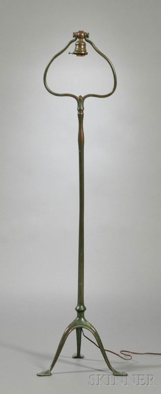 Tiffany Studios Floor Lamp Bronze verdigris New Yo: Tiffany Studios Floor Lamp Bronze verdigris New York, early 20th century Single swivel socket on harp, swollen cylindrical standard raised on three spade feet, marked Tiffany Studios New York 423 on b