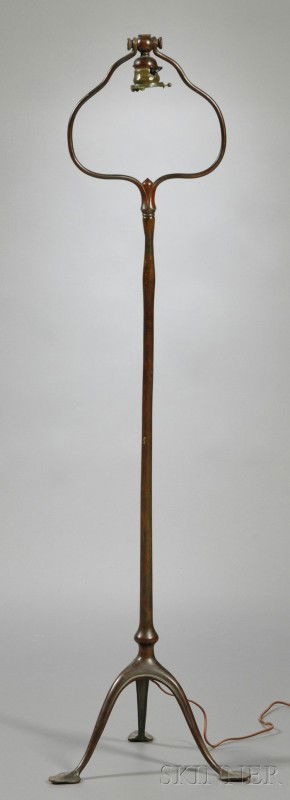 Tiffany Studios Floor Lamp Bronze verdigris New Yo: Tiffany Studios Floor Lamp Bronze verdigris New York, early 20th century Single swivel socket within harp on swollen cylindrical standard raised on three spade feet, marked Tiffany Studios, New York,s