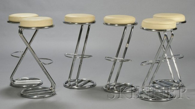 Six Z-shape Machine Age style Bar Stools Chromed : Six Z-shape Machine Age style Bar Stools Chromed metal and upholstery Round cream upholstered seat on cantilevered double tubular support continuing to circular base, with footrest, approx. ht. 32, di