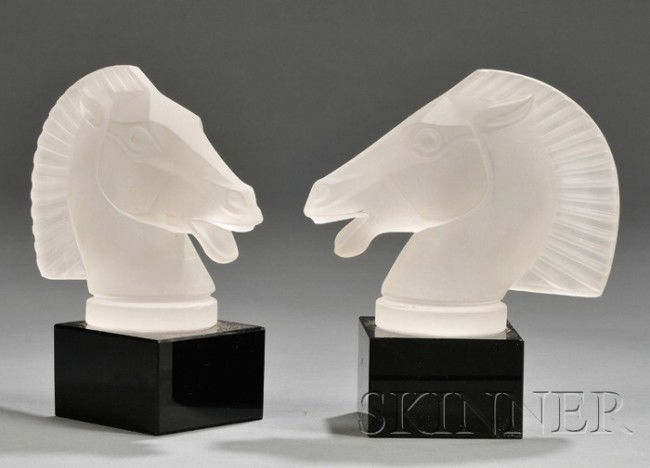 Pair of Etched Glass Horse Head Bookends 20th cen: Pair of Etched Glass Horse Head Bookends 20th century Mounted on square black glass bases, ht. 7 1/4 in.