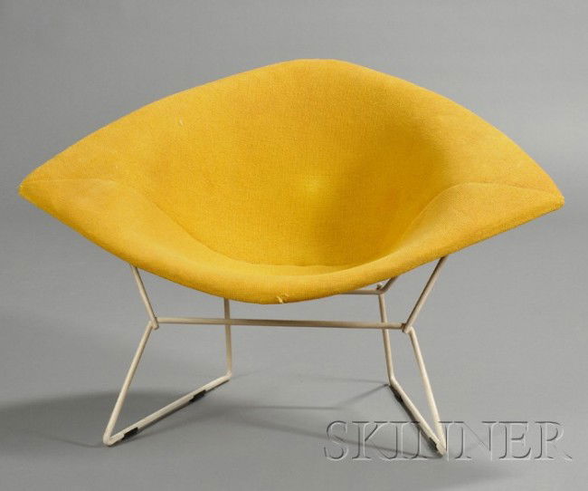 Harry Bertoia Diamond Chair Plastic coated steel a: Harry Bertoia Diamond Chair Plastic coated steel and upholstery United States, mid 20th century Wire mesh frame with yellow upholstered slip cover, upholstery wear and stains, approx. ht. 30, wd. 331/