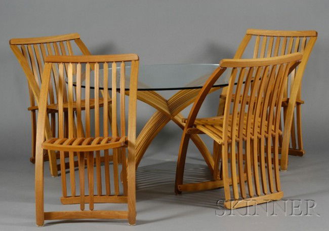 Dining Table and Four Chairs Glass and wood Fourth: Dining Table and Four Chairs Glass and wood Fourth quarter 20th century Oval glass top supported on an X-shape base with twelve slats interlacing eleven slats, the conforming chairs with eight slats f