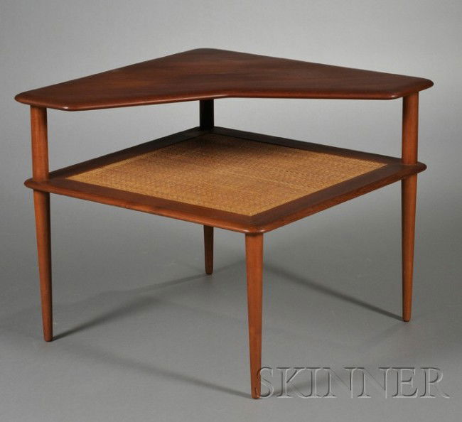 Peter Hvidt for France & Sons Corner Table Teak an: Peter Hvidt for France & Sons Corner Table Teak and cane Denmark, c. 1962 Shaped top shelf over lower cane shelf raised on four tapering cylindrical legs, France & Sons metal label, approx. ht. 25 1/4