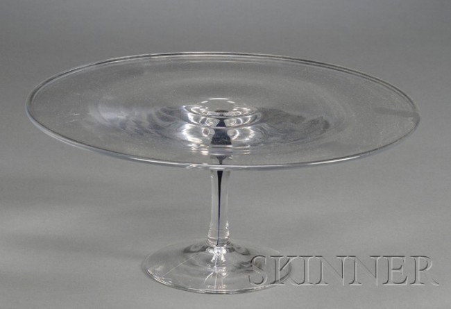 Orrefors Footed Plate Art glass Sweden, mid-20th c: Orrefors Footed Plate Art glass Sweden, mid-20th century Round plate on cylindrical stem with blue trapped bubble raised on circular foot, with Orrefors label, ht. 5 1/4, dia. 12 in.