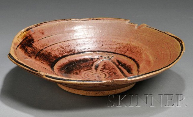 Pottery Bowl Attributed to Robert Archambault Glaz: Pottery Bowl Attributed to Robert Archambault Glazed stoneware Providence, Rhode Island, c. 1964 Free-edge shallow round footed bowl with molded relief design at center, glazed in shades of brown with