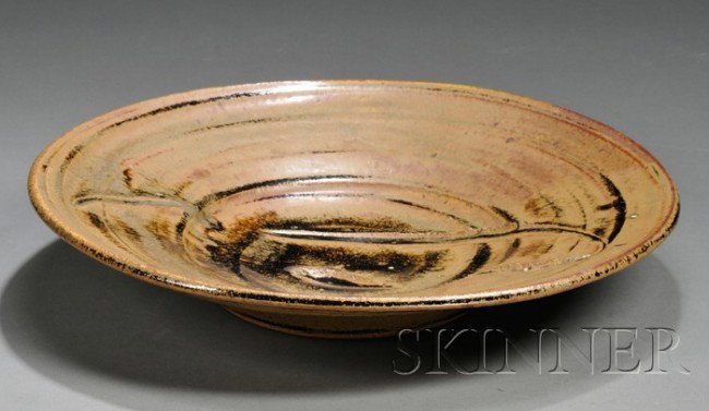 Pottery Bowl Attributed to Robert Archambault Ston: Pottery Bowl Attributed to Robert Archambault Stoneware Providence, Rhode Island, c. 1964 Shallow round footed bowl with molded vegetal relief design at center, glazed in shades of brown, with dark br