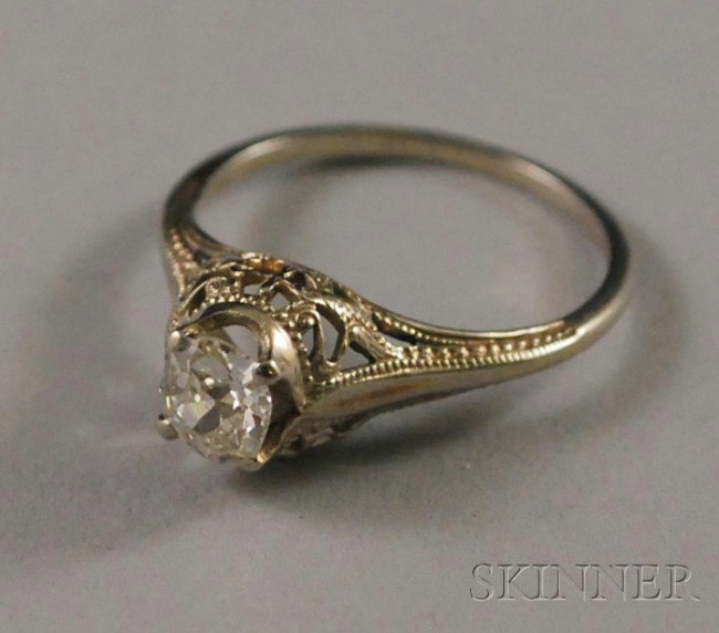 18kt White Gold and Diamond Solitaire, size 6.: 18kt White Gold and Diamond Solitaire, size 6.