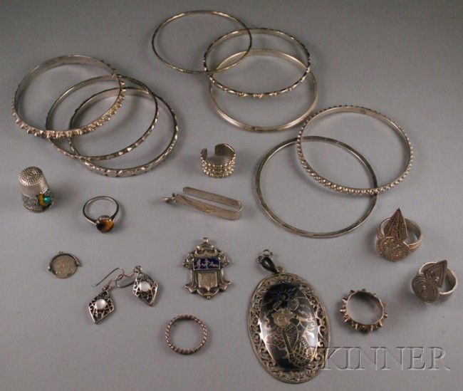 Group of Mostly Middle Eastern Sterling Silver Jew: Group of Mostly Middle Eastern Sterling Silver Jewelry, including bangles, rings, a thimble, and other items. Provenance: Items purportedly gifts from the Sultanate of Oman.
