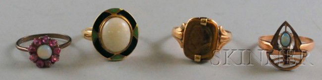 Four Antique Gold Gem-set Rings, a 10kt gold, opal: Four Antique Gold Gem-set Rings, a 10kt gold, opal, and enamel Art Deco ring, a 10kt gold and carved tiger's-eye ring, and two gold, opal, and pink gemstone rings.