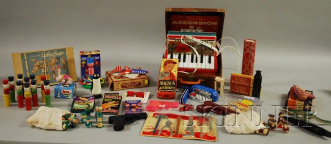 Group of Mostly Plastic Musical Instruments and : Group of Mostly Plastic Musical Instruments and Other Toys, including a Golden Piano accordion in original box, two Jeffrey "57" telescopes, a mid-20th century clockwork Jumping Rabbit toy, a Magnus k