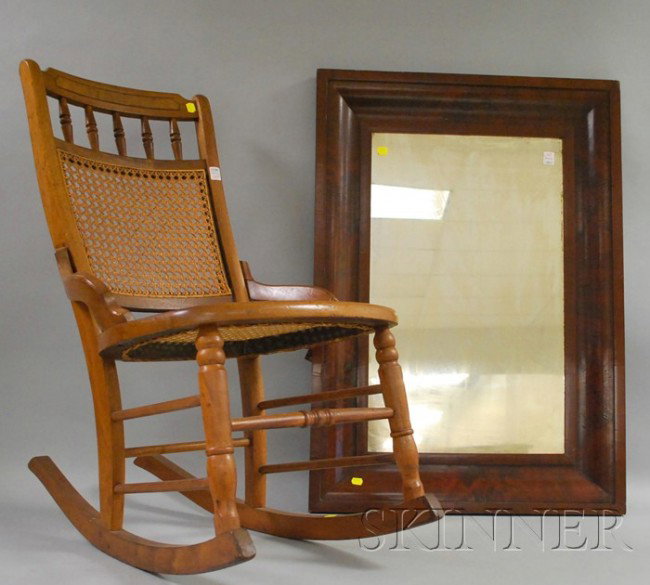 Empire Mahogany Veneer Ogee Mirror and a Victoria: Empire Mahogany Veneer Ogee Mirror and a Victorian Caned Walnut Rocker.