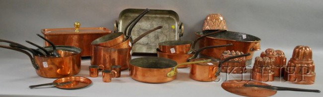 Twenty-three Pieces of Mostly French Copper Cooki: Twenty-three Pieces of Mostly French Copper Cooking and Kitchenware, including five culinary molds, three small cups, a set of eleven pans with wrought iron handles, a bread box, a roasting pan, a pot