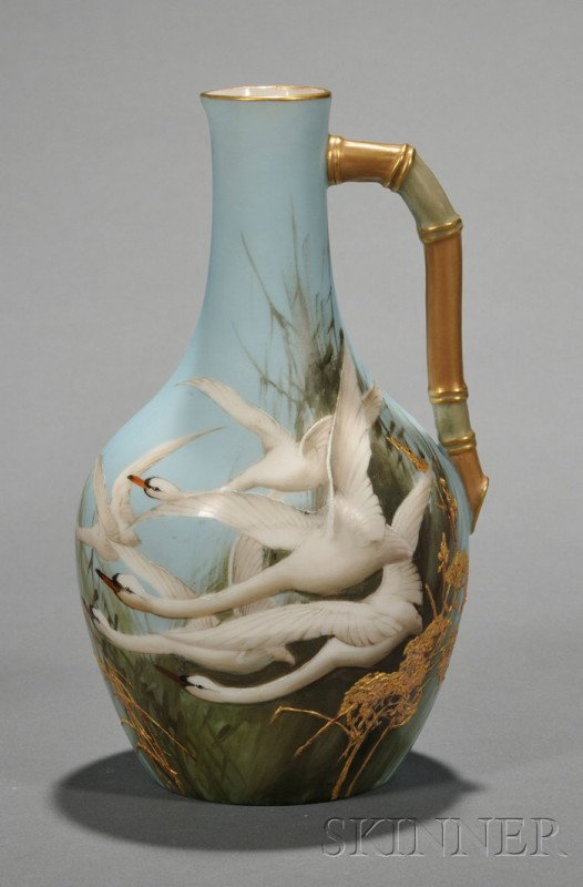 Royal Worcester Porcelain Charles Baldwyn Painted C: Royal Worcester Porcelain Charles Baldwyn Painted Claret Jug, England, 1893, bottle shape with bamboo handle, polychrome enameled and gilded with depiction of geese in flight, artist signed, printed m