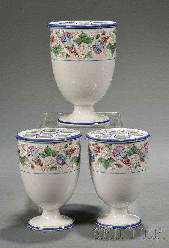 Three Piece Wedgwood Pearlware Bough Pot Garniture: Three Piece Wedgwood Pearlware Bough Pot Garniture, England, early 19th century, each grid cover with pierced holes, polychrome enamel decorated with blue trim lines and a wide floral and foliate band