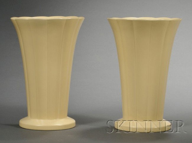 Three Wedgwood Keith Murray Design Matte Straw Sli: Three Wedgwood Keith Murray Design Matte Straw Slip Glazed Items, England, c. 1935, two fluted vases, shape 4124, ht. 8 1/4 in.; and a water pitcher, shape 4193 of barrel shape and with engine-turned