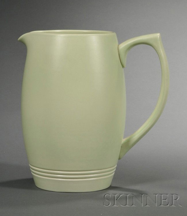 Two Wedgwood Keith Murray Design Apple Green Slip: Two Wedgwood Keith Murray Design Apple Green Slip Glazed Items, England, c. 1935, a beer jug shape 3822, ht. 8 1/4 in.; and a mug shape 3810, ht. 4 3/4 in.; both with engine-turned band at base, print
