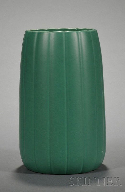 Wedgwood Keith Murray Design Matte Green Slip Glaz: Wedgwood Keith Murray Design Matte Green Slip Glazed Vase, England, c. 1935, shape 4128, with slightly tapering fluted sides, printed mark, ht. 7 3/4 in.