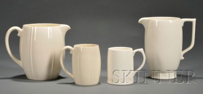 Four Wedgwood Keith Murray Design Queen's Ware Ite: Four Wedgwood Keith Murray Design Queen's Ware Items, England, 1935-45, a beer jug with faceted foot, shape 3974, ht. 8 5/8 in.; a jug with ribbed body, ht. 7 3/4 in.; a ribbed mug, shape 3970, ht. 5