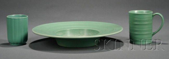 Three Wedgwood Keith Murray Design Green Slip Glaz: Three Wedgwood Keith Murray Design Green Slip Glazed Items, England, c. 1935, a tumbler shape 4155 with fluted sides, ht. 4 3/8 in.; a mug with concentric banding, ht. 4 3/4 in.; and a tray/bowl shape