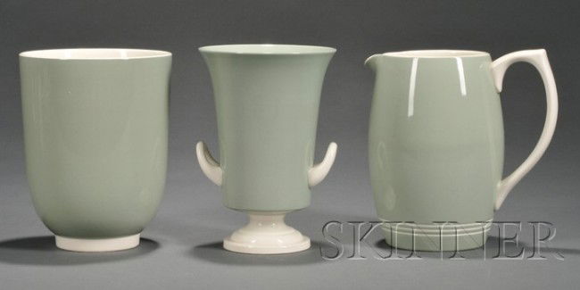 Three Wedgwood Keith Murray Design Celedon Slip Gl: Three Wedgwood Keith Murray Design Celedon Slip Glazed Items, England, 1940-51, each with cream colored slip glazed trim, including a beer jug shape 4193 with engine-turned bands near foot, ht. 8 in.;