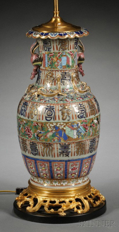 Chinese Celadon Porcelain Lamp Base, China, 19th : Chinese Celadon Porcelain Lamp Base, China, 19th century, gilded and polychrome enamel decorated with bands of flowers and Chinese characters, raised lizards to shoulder, phoenix handles, ht. to rim 1