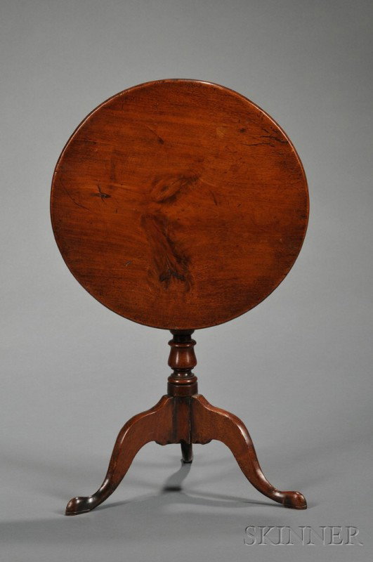 George III Mahogany Miniature Tilt-top Tripod Tab: George III Mahogany Miniature Tilt-top Tripod Table, England, second quarter 18th century, with a circular top above a turned baluster-shaped pillar, raised on tapering cabriole legs ending in pointed