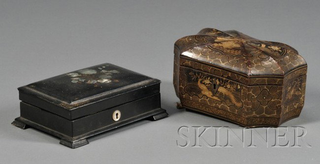 Two Victorian Boxes, late 19th century, a Japanne: Two Victorian Boxes, late 19th century, a Japanned bombe ovoid tea caddy, fitted with two pewter tea cannisters, with gilt paw feet, wd. 8, and a black-painted papier mache trinket box with hinged lid