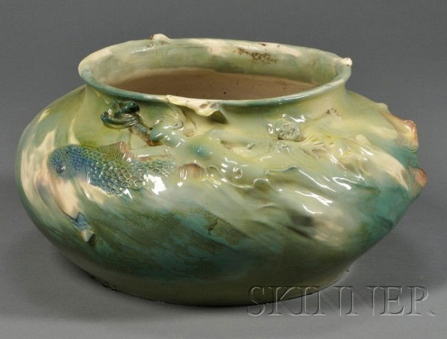 Rorstrand Jugendstil Artist Designed Earthenware: Rorstrand Jugendstil Artist Designed Earthenware Jardiniere, Sweden, c. 1897, signed by Alf Wallander and dated "97," the ovoid vessel with overall mottled green glaze, modeled at rim with a figure of