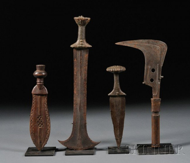 Four African Knives, various tribes and forms, inc: Four African Knives, various tribes and forms, includes a wooden knife and a Mangbetu curved-blade form, ht. to 18 3/4 in.
