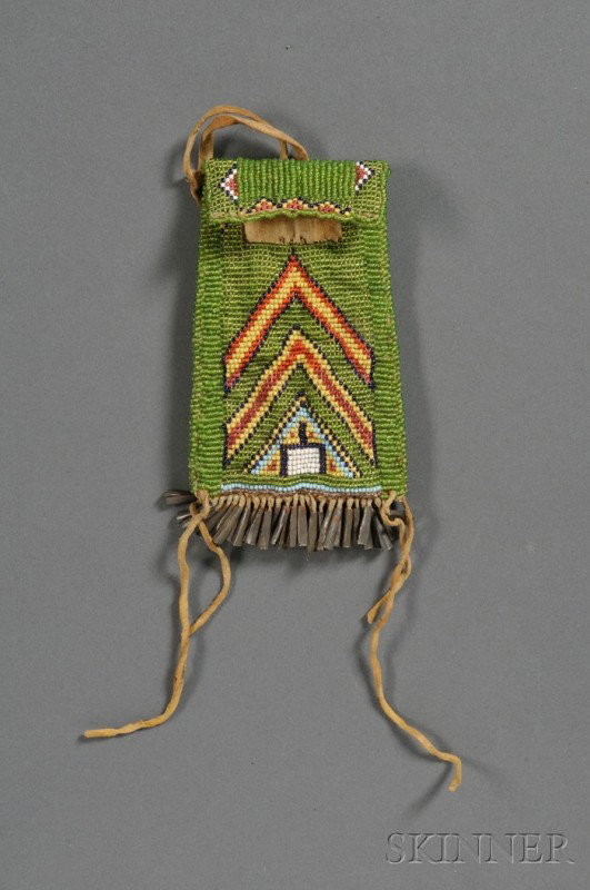 Plateau Beaded Hide Pouch, Ute, c. 1900, loom-bead: Plateau Beaded Hide Pouch, Ute, c. 1900, loom-beaded with chevron devices on a translucent green background, tin cones at the bottom, 5 x 3 1/4 in.