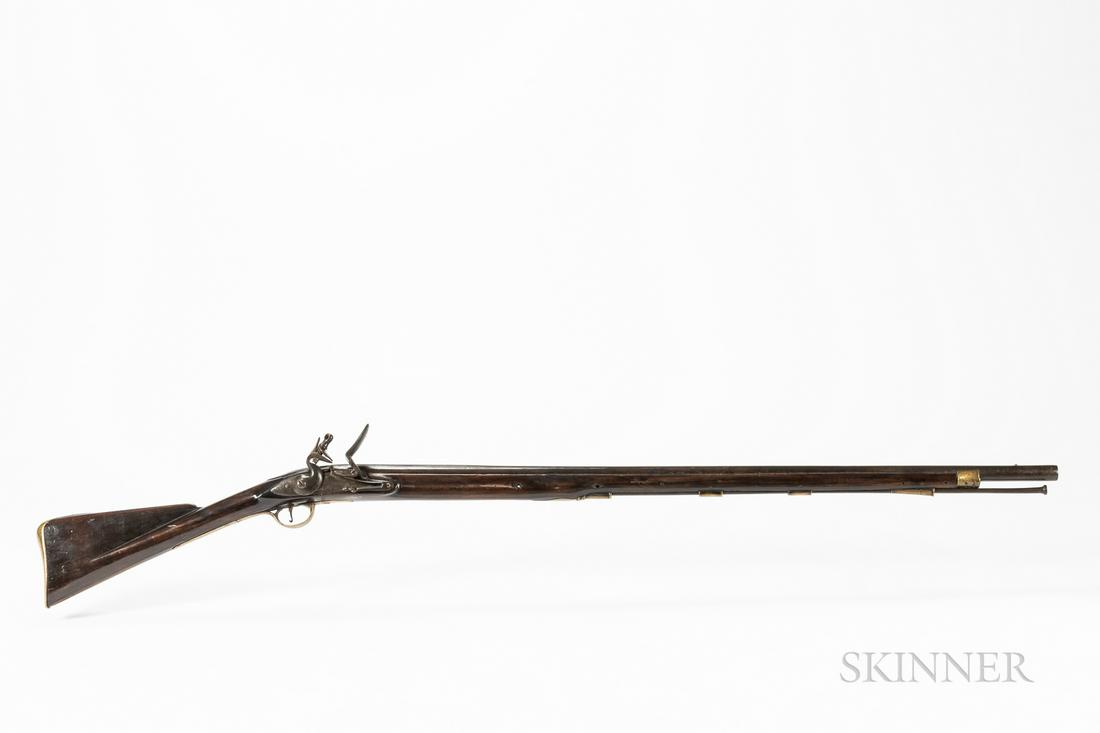 New England Military Musket: New England Military Musket, c. 1765-75, of British Land Pattern-style, with 37 1/8 in., .72 caliber unmarked octagon to round barrel; double bridle American-made slightly curved and convex surface lo