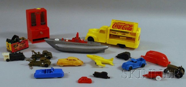Group of Plastic Toy Vehicles and Other Toys, includ: Group of Plastic Toy Vehicles and Other Toys, including an Ideal submarine, a 1940 Ford Coca Cola truck with five Coke cases and bottles, a G. Felsenthal Hershey's Bar Bank, a Banner toy tractor, a Mi