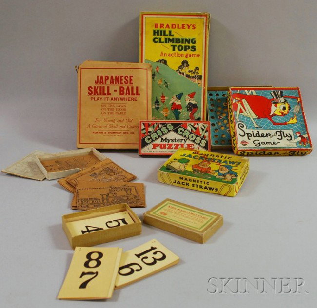 Seven Games, including Milton Bradley "Hill Climbin: Seven Games, including Milton Bradley "Hill Climbing Tops," "Magnetic Jack Straws," and "Spider and Fly Game"; Zulu "Cross Cross Mystery Puzzle"; a Newton & Thompson "Japanese Skill-Ball" game; and tw