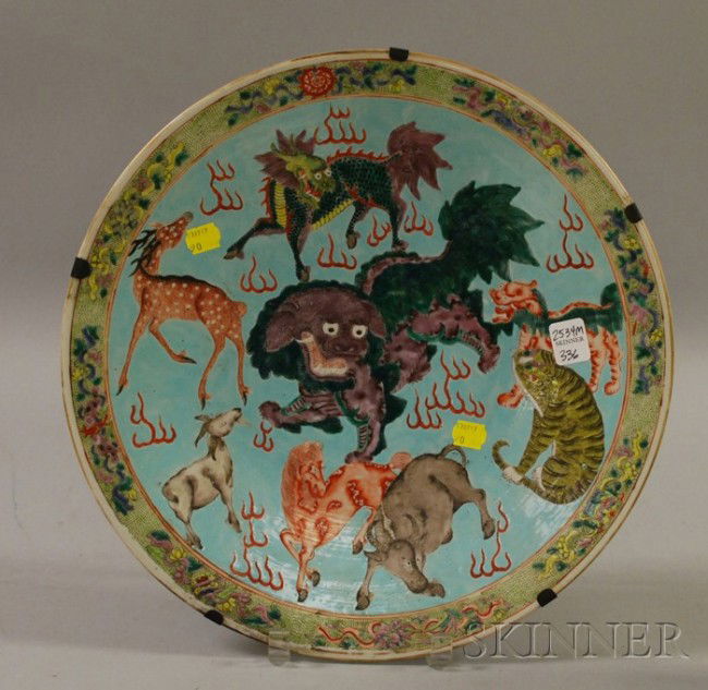 Chinese Porcelain Charger, with dragon, horse, dee: Chinese Porcelain Charger, with dragon, horse, deer, goat, tiger, and mythical beasts, light green background with scroll decorated rim, signed, dia.. 14 1/2 in.