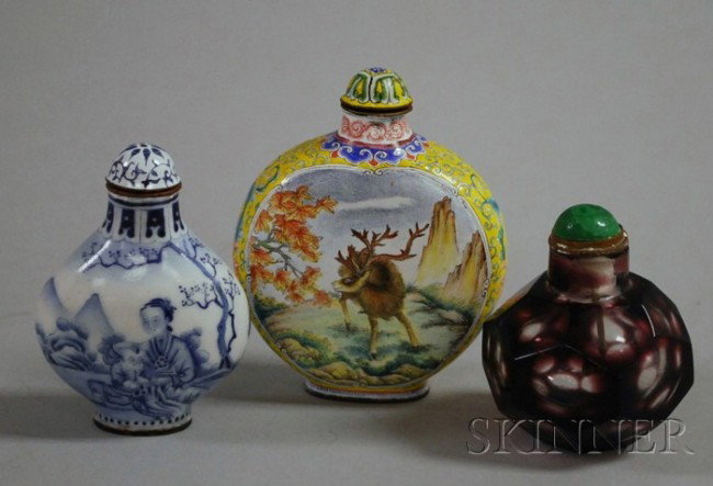 Three Chinese Snuff Bottles, a porcelain bottle de: Three Chinese Snuff Bottles, a porcelain bottle depicting two deer on one side with a single deer on the reverse, ht. 2 3/4, a blue and white porcelain bottle with mother and child in a garden scene w