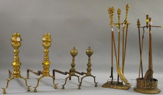 Two Pairs of Brass Andirons and Eight Brass Firep: Two Pairs of Brass Andirons and Eight Brass Fireplace Tools and Stands, including belted ball-top and ball-top andirons, a stand with three tools, a pair of tools, a poker, and a tool stand.