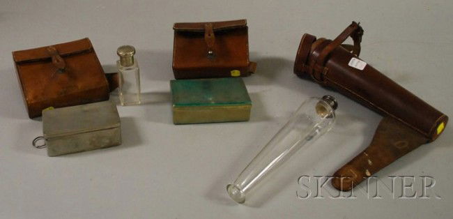 Three Vintage Equestrian Leather Cased Accessorie: Three Vintage Equestrian Leather Cased Accessories, a Swaine & Adeney Ltd. metal box with a small bottle, a John Dixon silver-plated box, and a silver-plated covered tapering glass flask.