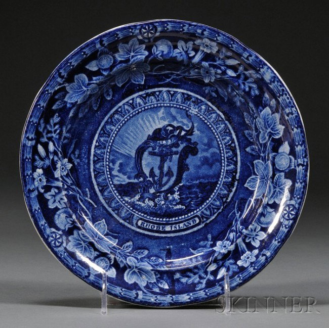 Blue Transfer-decorated Arms of Rhode Island Staff: Blue Transfer-decorated Arms of Rhode Island Staffordshire Pottery Plate, Thomas Mayer, Stoke, Cliff Bank Works, England, c. 1829, centered with the Arms of Rhode Island, with a floral and compass sta