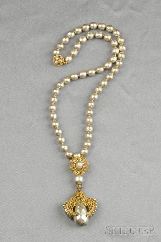 Gilded Metal and Imitation Pearl Necklace, Miriam H: Gilded Metal and Imitation Pearl Necklace, Miriam Haskell, suspending an openwork pendant of gilded metal, set with one large imitation pearl drop, completed by a necklace of imitation pearls, lg. 20