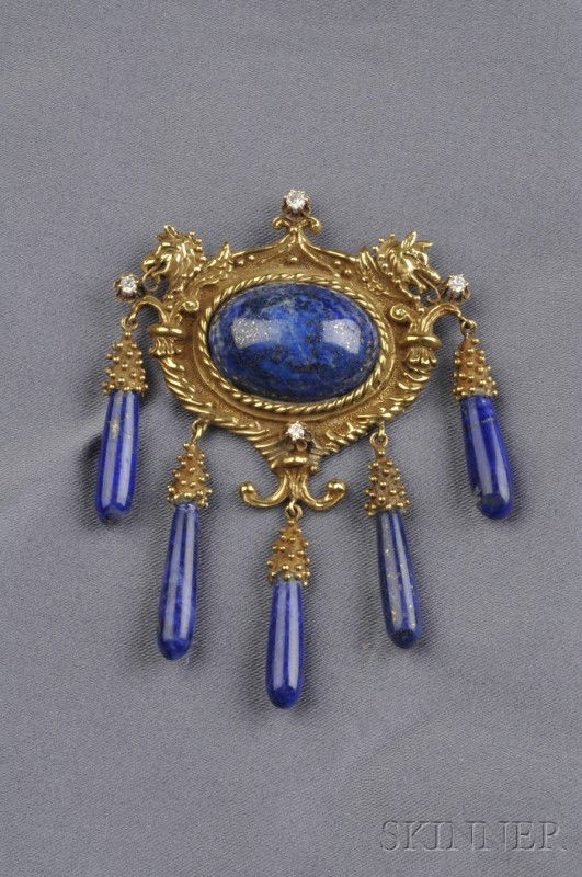 18kt Gold Lapis and Diamond Brooch/Pendant, Erwin: 18kt Gold Lapis and Diamond Brooch/Pendant, Erwin Pearl, the scrolling mount with griffin motifs, set with an oval cabochon lapis measuring approx. 22.00 x 17.00 mm, suspending five lapis drops, full-