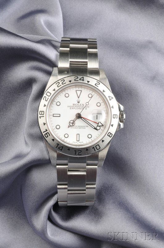 Stainless Steel Wristwatch "Explorer II" Rolex, "O: Stainless Steel Wristwatch "Explorer II" Rolex, "Oyster Perpetual Date", the white dial with abstract numeral indicators and date aperture, 24-hour bezel and 12-hour hand, completed by an oyster band