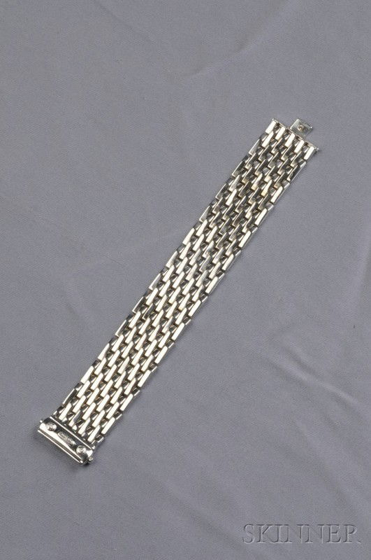 18kt Gold Bracelet, Chimento, composed of brickwor: 18kt Gold Bracelet, Chimento, composed of brickwork links, reversing to white gold, 40.1 dwt, lg. 7 1/8 in., signed.