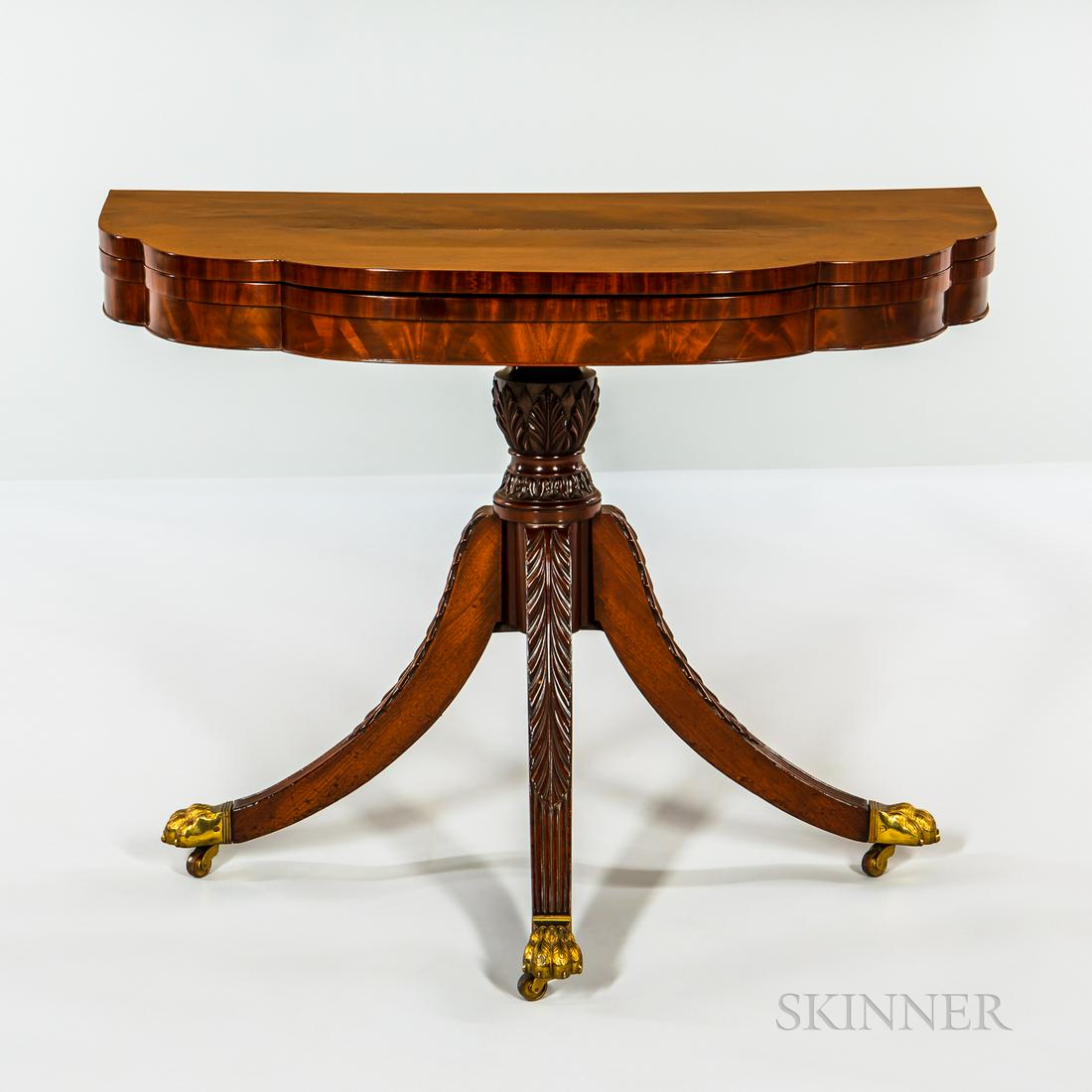 Federal Mahogany Carved and Mahogany Veneer Card Table, attributed to Duncan Phyfe, New York, the: Federal Mahogany Carved and Mahogany Veneer Card Table, attributed to Duncan Phyfe, New York, the shaped folding top with baize interior on conforming beaded frame, and a vase- and ring-turned acanthu