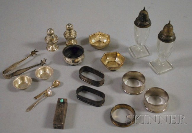 Group of Sterling Silver Table and Personal Items,: Group of Sterling Silver Table and Personal Items, including two pairs of napkin rings, two pairs of individual salts, an Italian .800 silver lipstick case, a pair of tongs, etc.