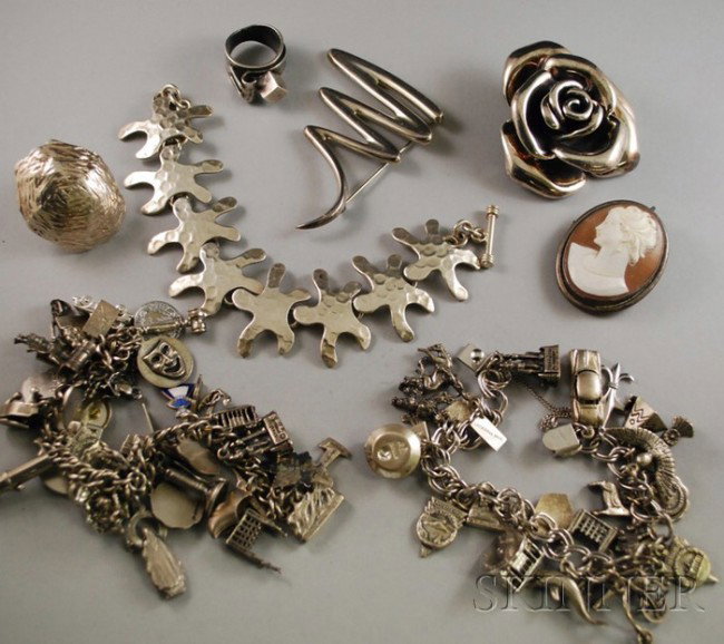 Group of Mostly Sterling Silver Jewelry, including: Group of Mostly Sterling Silver Jewelry, including a Paloma Picasso for Tiffany & Co. "Squiggle" brooch, a silver-framed shell-carved cameo brooch, two American travel-themed charm bracelets, and othe