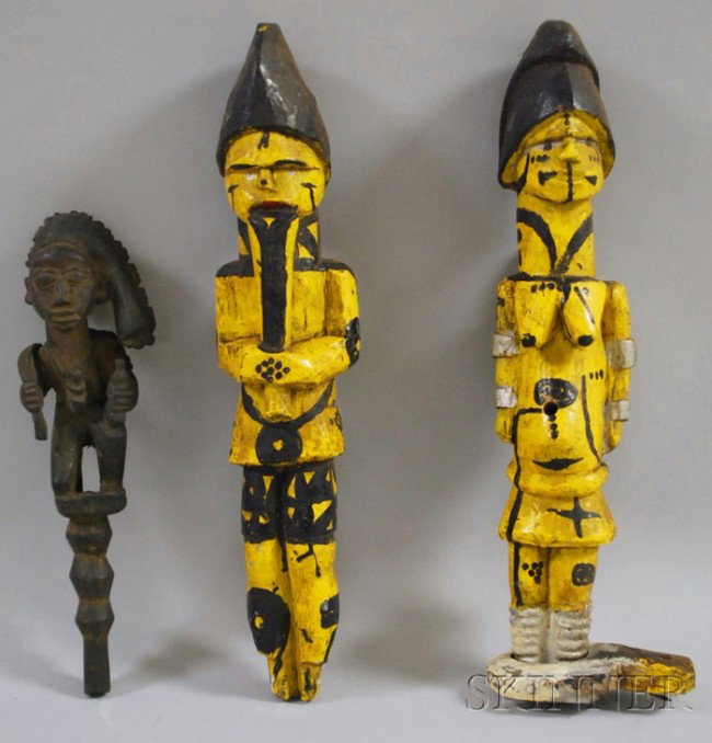 Yoruba Carved Wooden Staff and a Pair of Painted I: Yoruba Carved Wooden Staff and a Pair of Painted Ibo Figures, ht. 16 1/2 in.