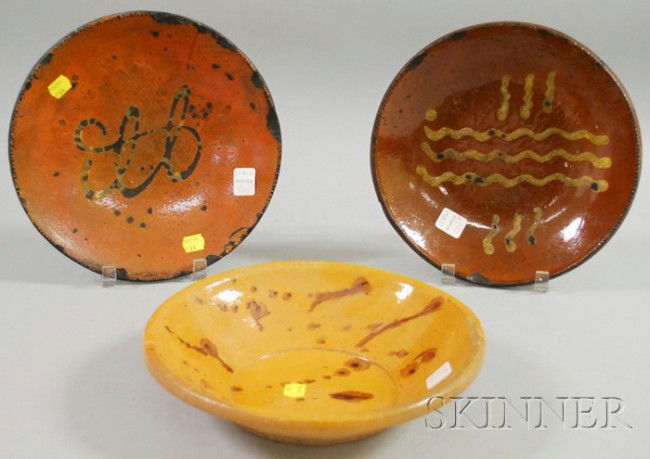 Two Slip-decorated Redware Dishes and a Glazed Pot: Two Slip-decorated Redware Dishes and a Glazed Pottery Bowl, plate dia. 10 in.